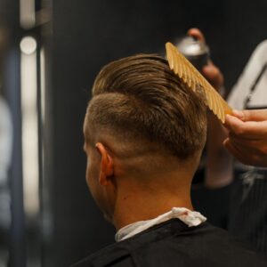 A male at the barbershop.